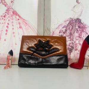 Guy Laroche Vintage Clutch with shoulder strap.